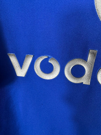 Détail micro usure sur sponsor Vodafone du maillot Manchester United 2002-2003 third taille XXL