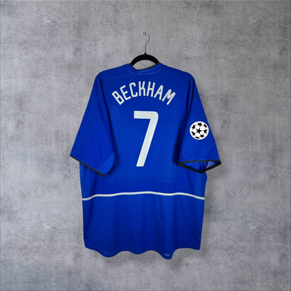 Dos du maillot Manchester United 2002-2003 third bleu avec flocage Beckham N°7 et patch Champions League authentique