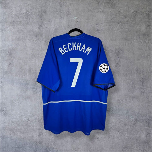 Dos du maillot Manchester United 2002-2003 third bleu avec flocage Beckham N°7 et patch Champions League authentique
