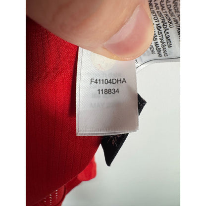 Étiquette d'authenticité avec code Nike 118834 prouvant l'originalité du maillot
