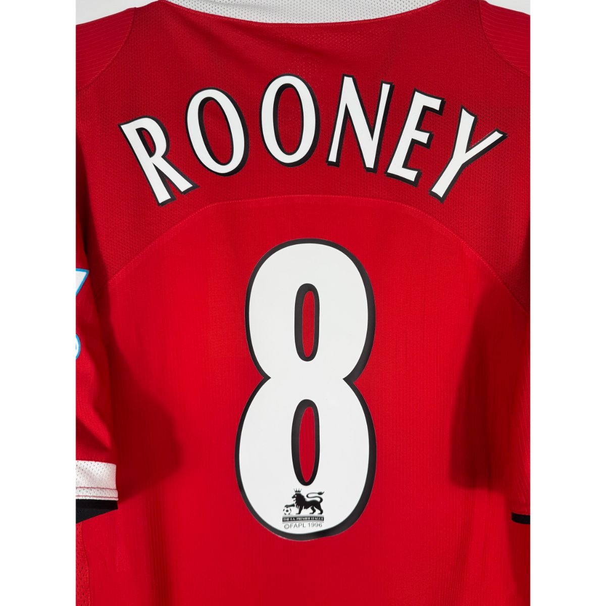 Détail de la typographie du flocage sur le numéro 8 de Wayne Rooney