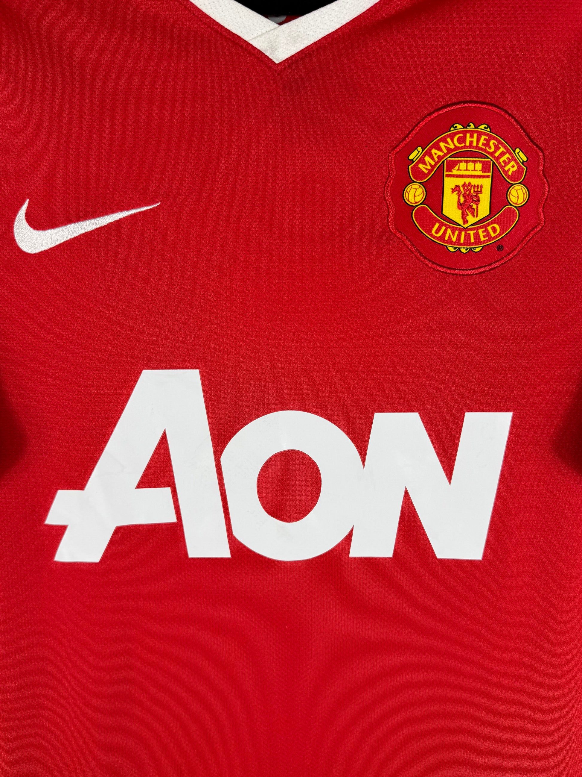 Détail de l'écusson de Manchester United et du logo Nike