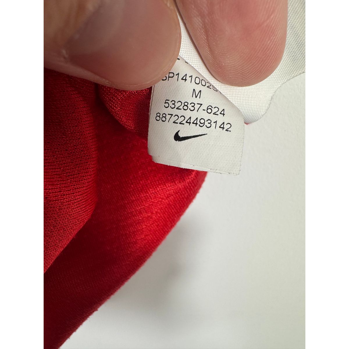 Étiquette d'authenticité avec code Nike 532837-624 prouvant l'originalité du maillot