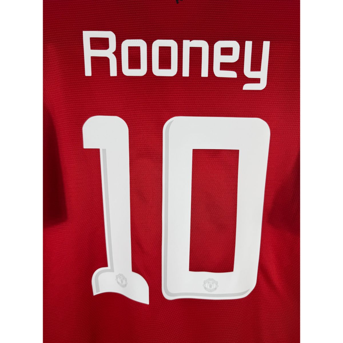 Détail de la typographie du flocage sur le numéro 10 de Wayne Rooney