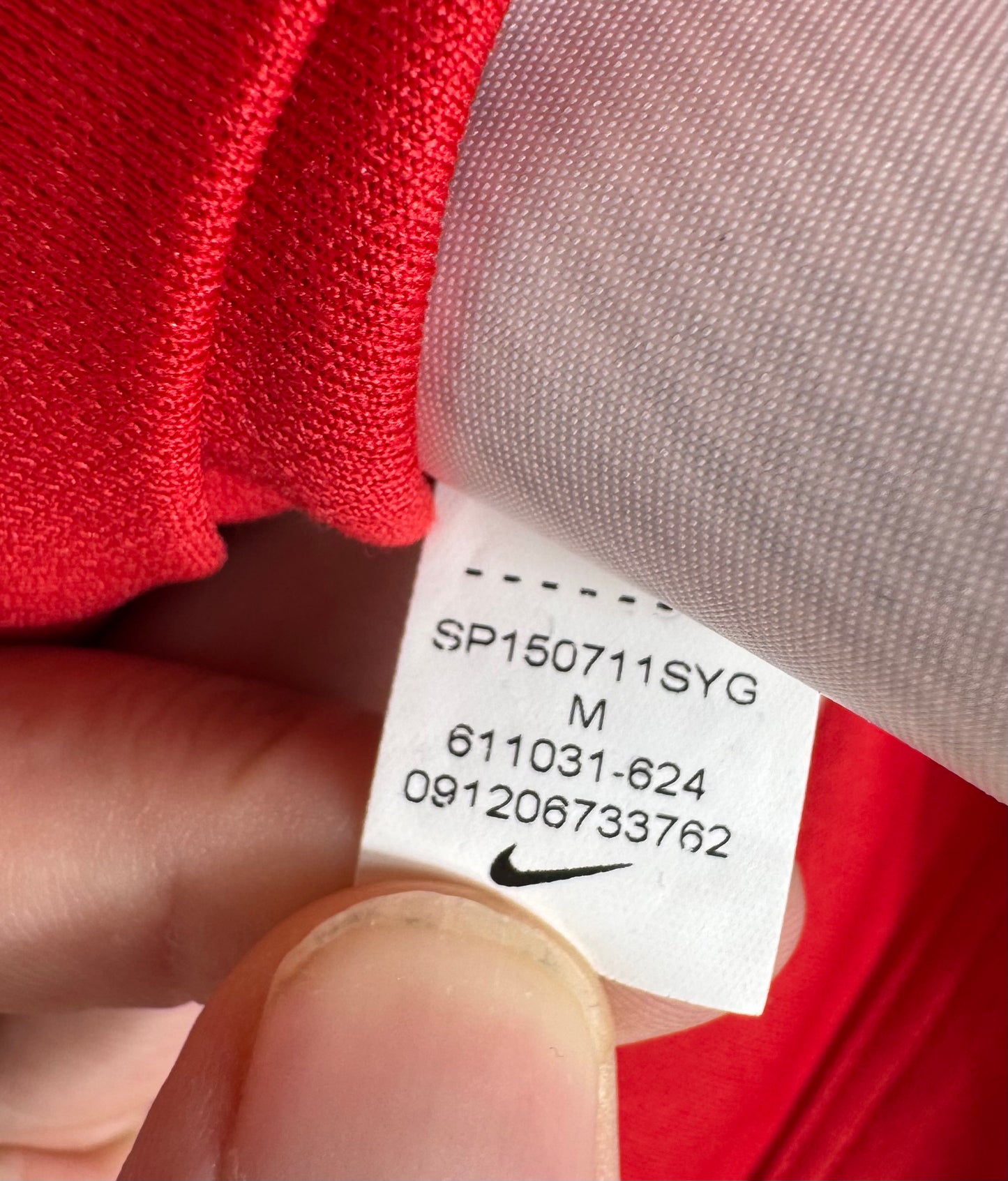 Étiquette d'authenticité avec code Nike 611031-624 prouvant l'originalité du maillot