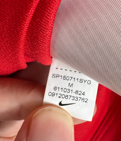 Étiquette d'authenticité avec code Nike 611031-624 prouvant l'originalité du maillot
