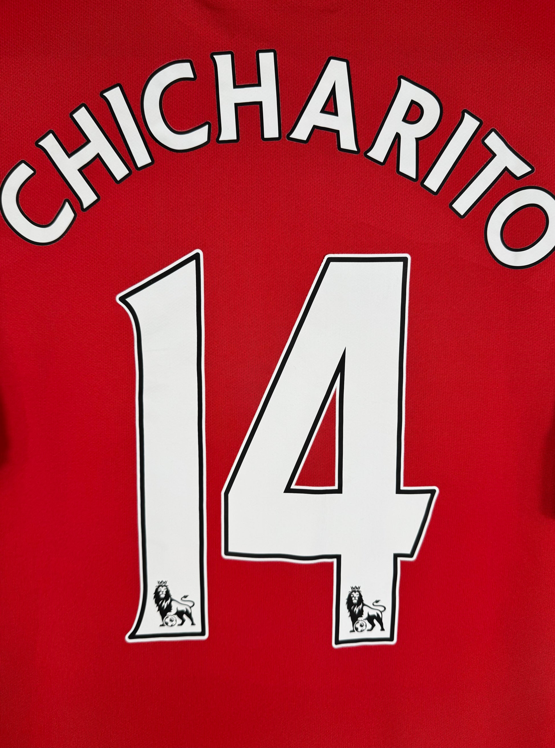 Détail de la typographie du flocage d'origine sur le numéro 14 de Javier Hernández