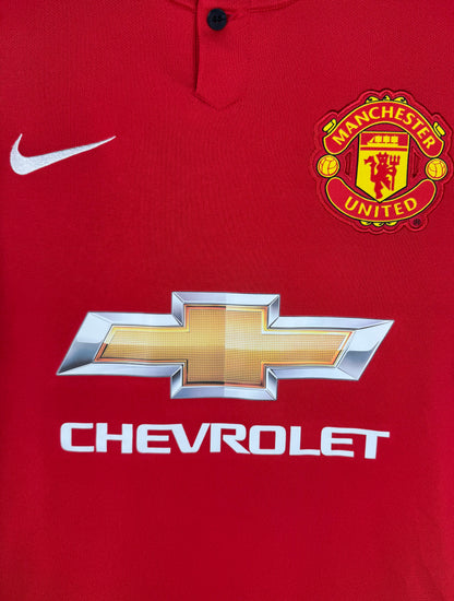Détail de l'écusson de Manchester United et du logo Nike