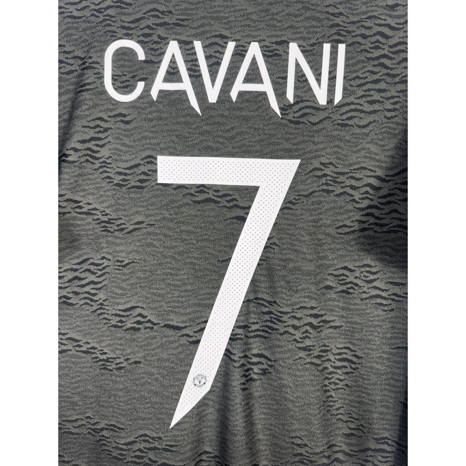 Détail de la typographie du flocage sur le numéro 7 d'Edinson Cavani