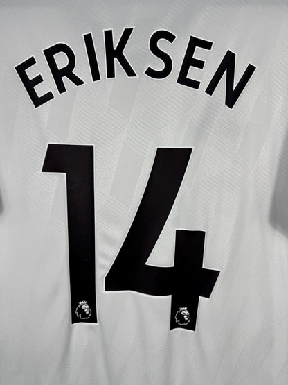 Détail du flocage Eriksen 14 avec badges Premier League, maillot Manchester United 2022-2023