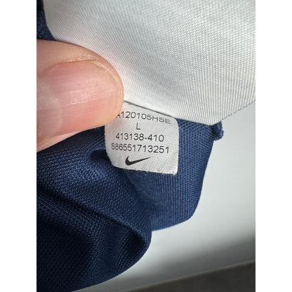 Étiquette d'authenticité avec code Nike 413138-410 prouvant l'originalité du maillot