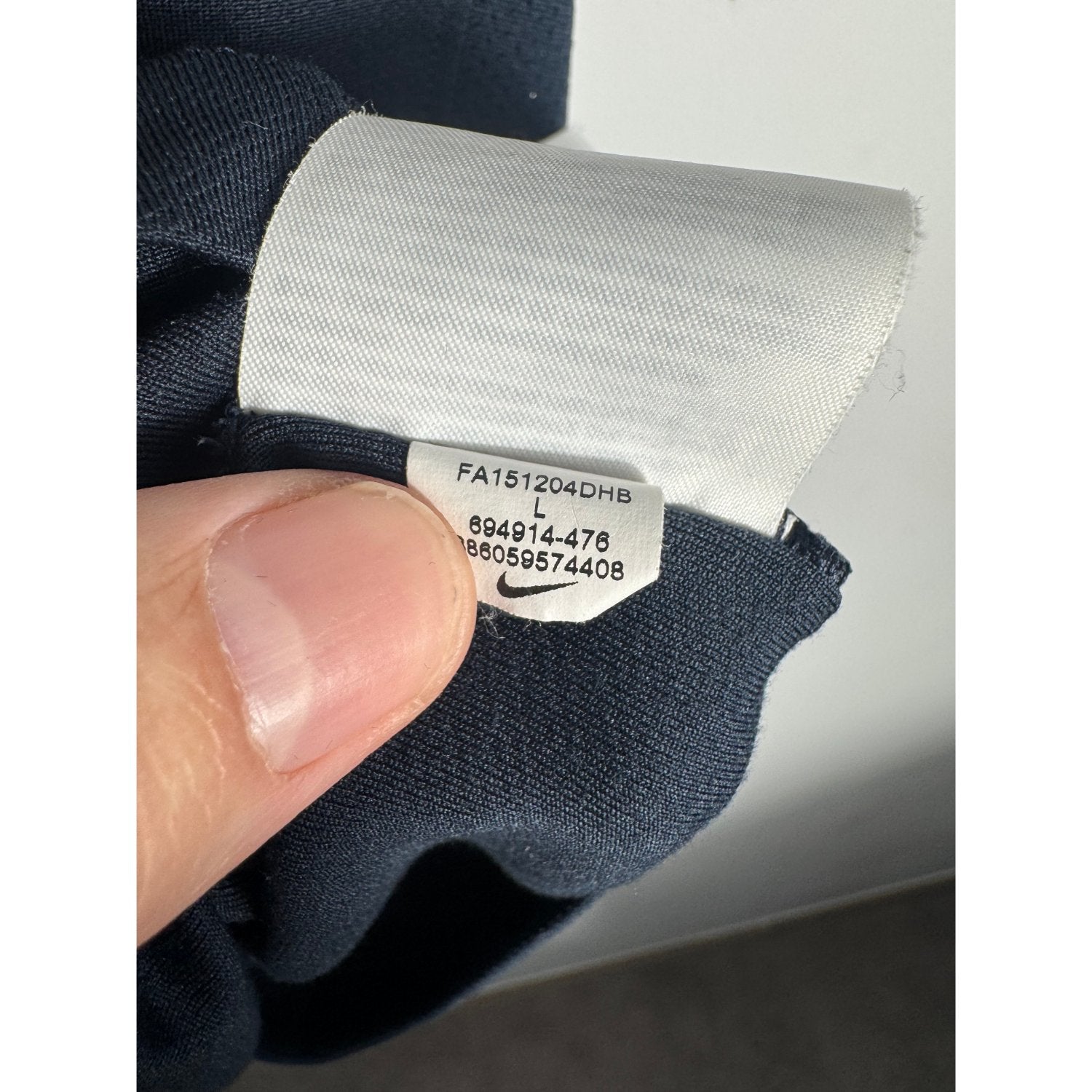 Étiquette intérieure d'authenticité avec code Nike 694914-476 prouvant l'originalité du maillot AS Monaco third 2016-2017