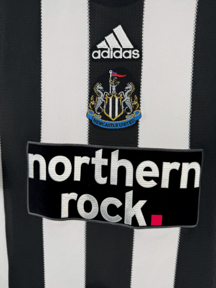 Écusson Newcastle United brodé et sponsor Northern Rock, maillot domicile 2009-2010