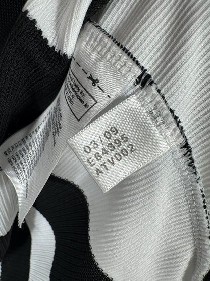 Étiquette adidas E84395 datée 03/09, maillot Newcastle domicile 2009-2010 Carroll