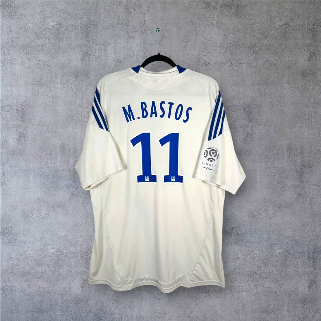 Flocage M.Bastos numéro 11 sur maillot OL 2010-2011 Domicile