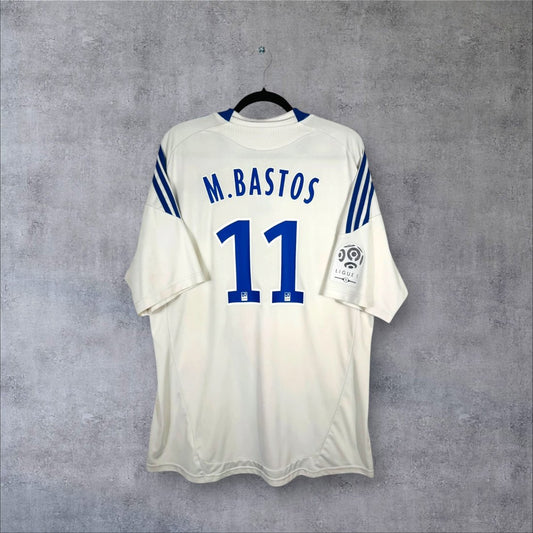 Flocage M.Bastos numéro 11 sur maillot OL 2010-2011 Domicile