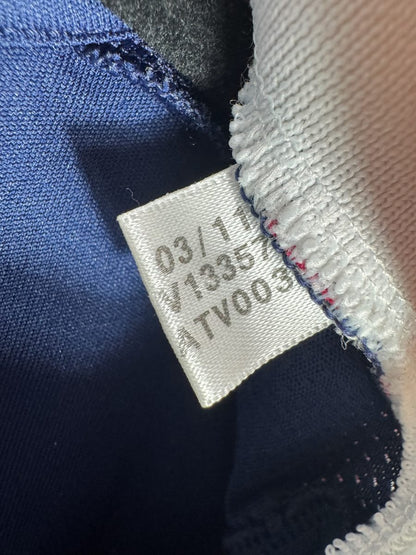 Étiquette intérieure adidas d'origine datée 03/11 du maillot OL 2011-2012 extérieur