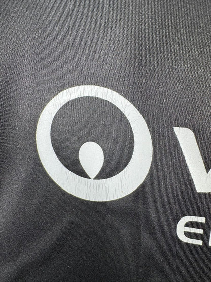 Usure légère du logo Veolia sur le maillot OL 2012-2013 third, micro craquelures signalées