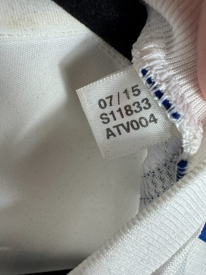 Étiquette intérieure adidas du maillot Olympique Lyonnais 2015-2016 avec le code d'authenticité S11833 et la date 07/15