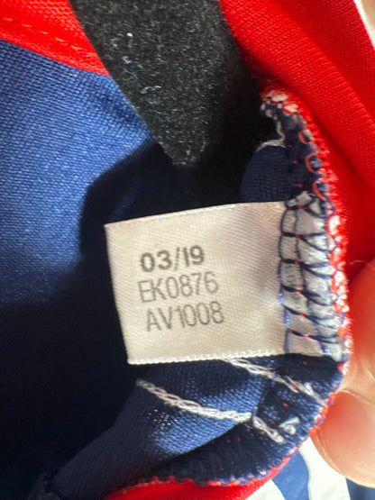 Étiquette d'authenticité avec code Adidas EK0876 prouvant l'originalité du maillot