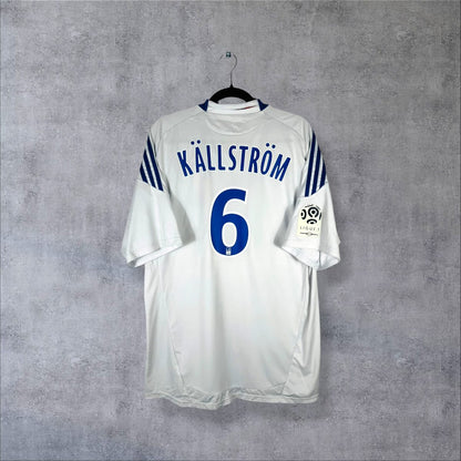 Dos du maillot Olympique Lyonnais 2010-2011 domicile avec flocage Källström numéro 6 et patch Ligue 1