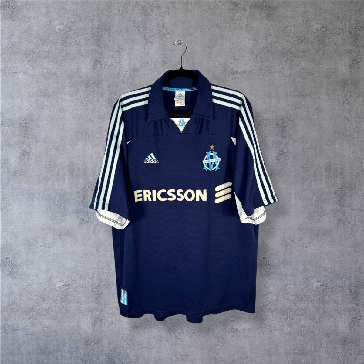Maillot OM 1999-2000 extérieur bleu marine Ericsson vu de face