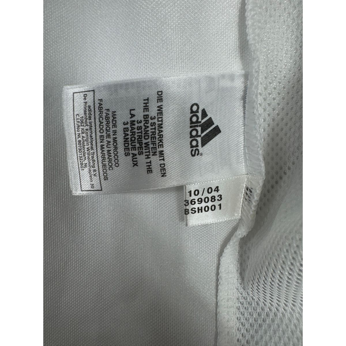 Étiquette d'authenticité avec code Adidas 369083 prouvant l'originalité du maillot