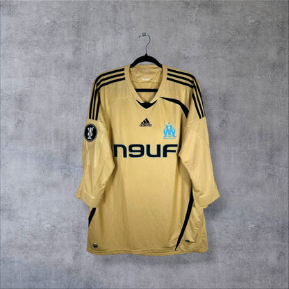 Face du maillot OM 2008-2009 third doré adidas avec sponsor n9uf et patch Coupe UEFA