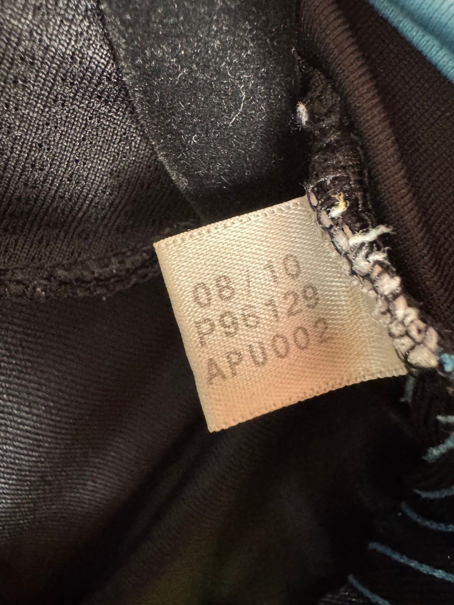 Étiquette d'authenticité avec code Adidas P96129 prouvant l'originalité du maillot