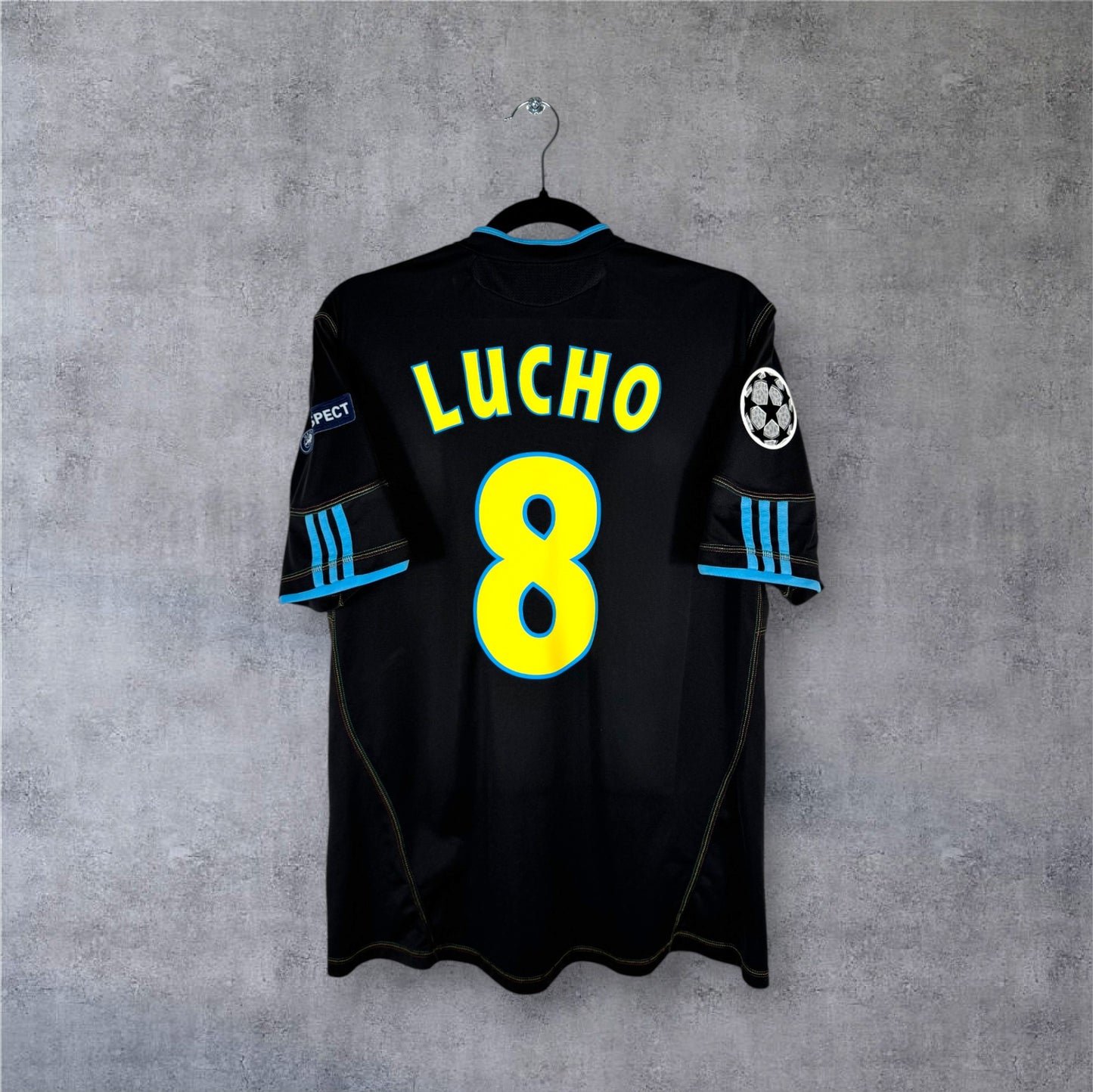 Flocage Lucho numéro 8 sur maillot OM 2010-2011 Third
