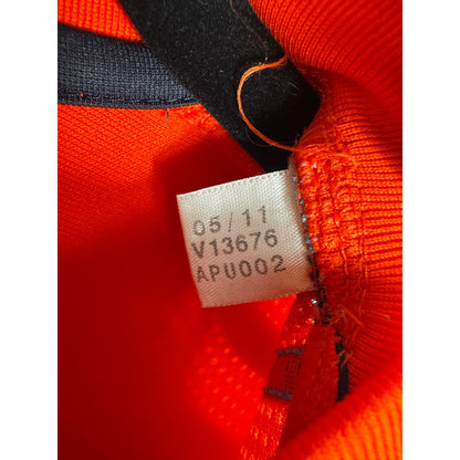 Étiquette d'authenticité avec code Adidas V13676 prouvant l'originalité du maillot