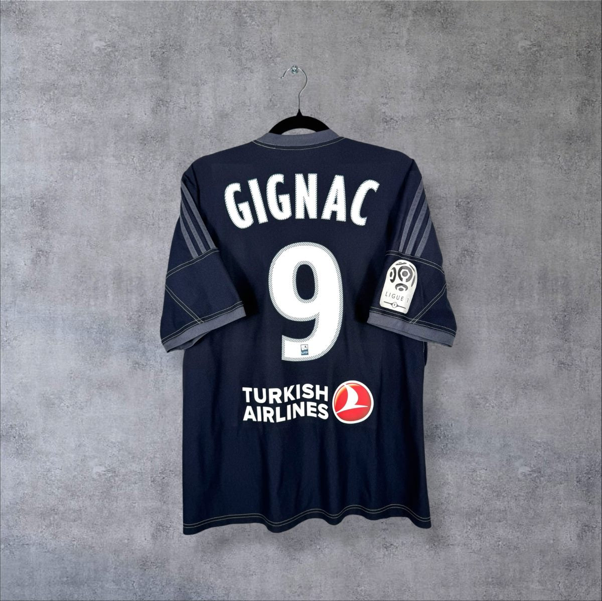 Dos du maillot extérieur OM 2013-2014 adidas bleu marine, flocage Gignac 9 et sponsor Turkish Airlines