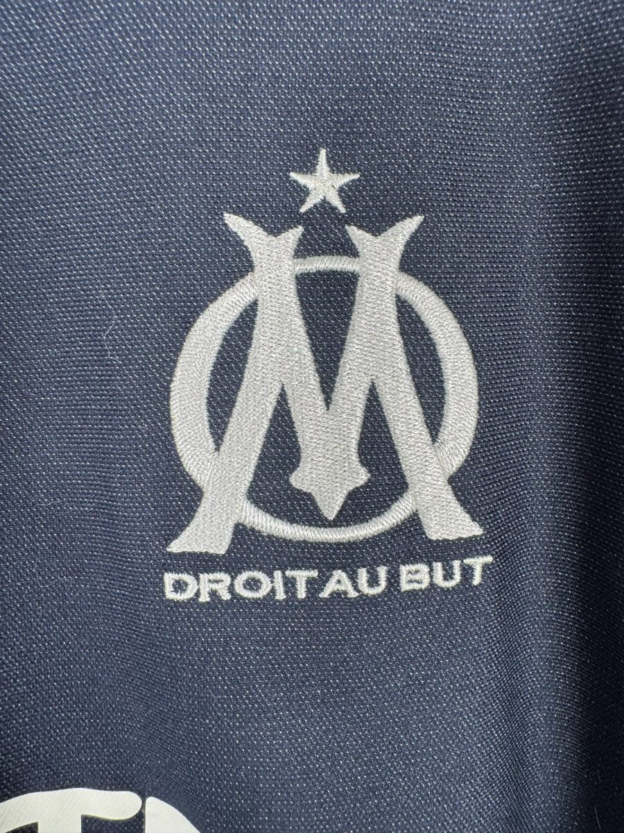 Écusson OM Droit au but et étoile sur le maillot extérieur 2013-2014