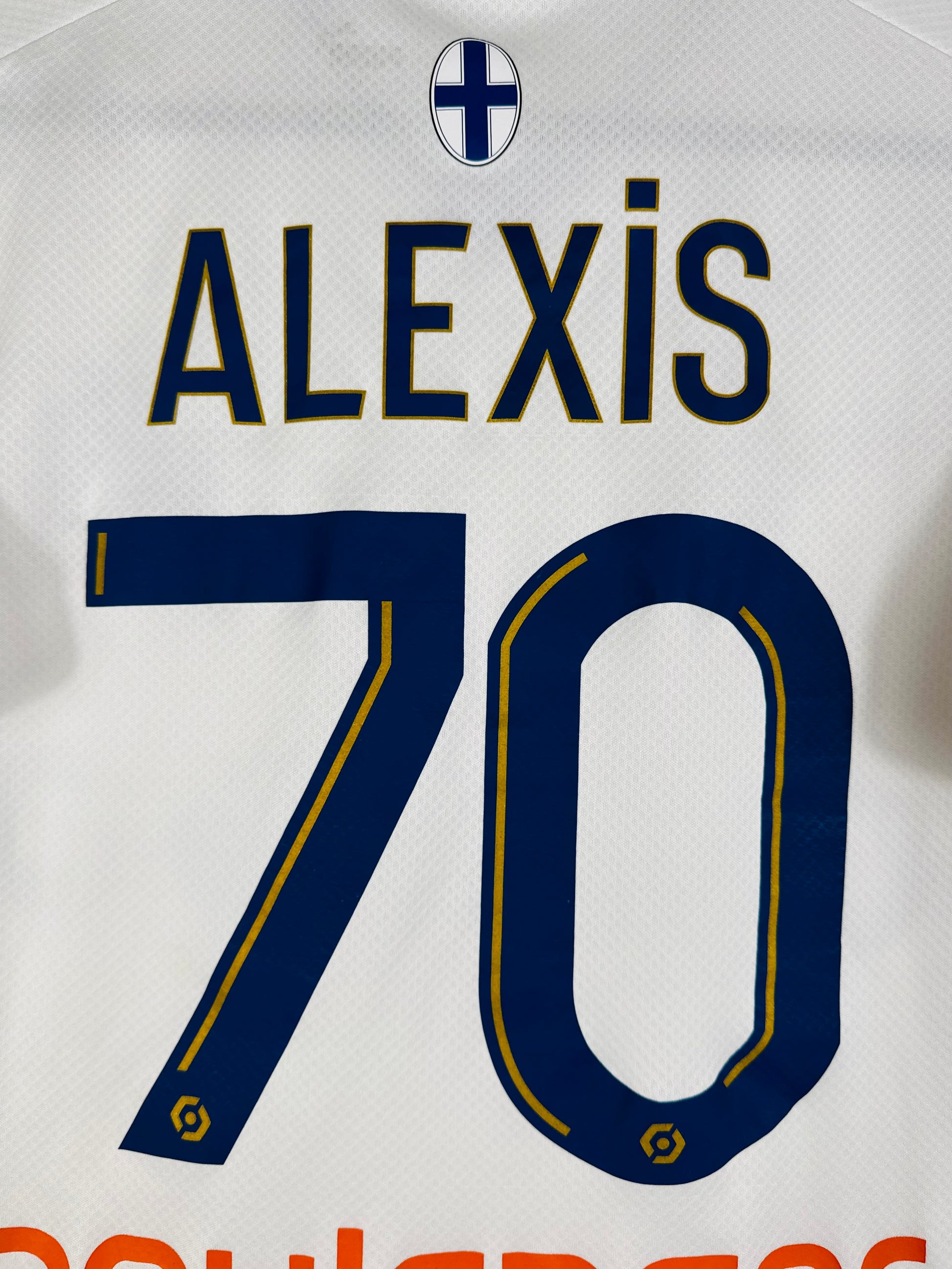 Détail de la typographie du flocage d'origine sur le numéro 70 d'Alexis Sánchez