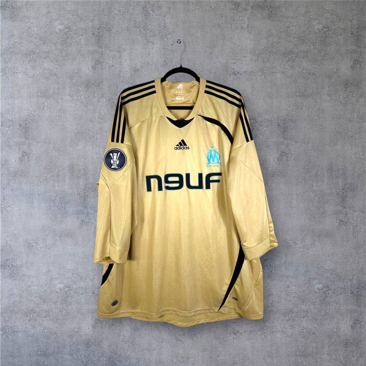 Vue de face du maillot Olympique de Marseille Third 2008/09 Or avec sponsor n9uf bleu.