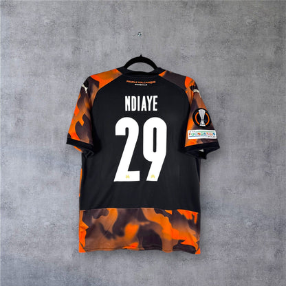 Dos du maillot OM Third noir et orange avec flocage blanc NDIAYE 29.