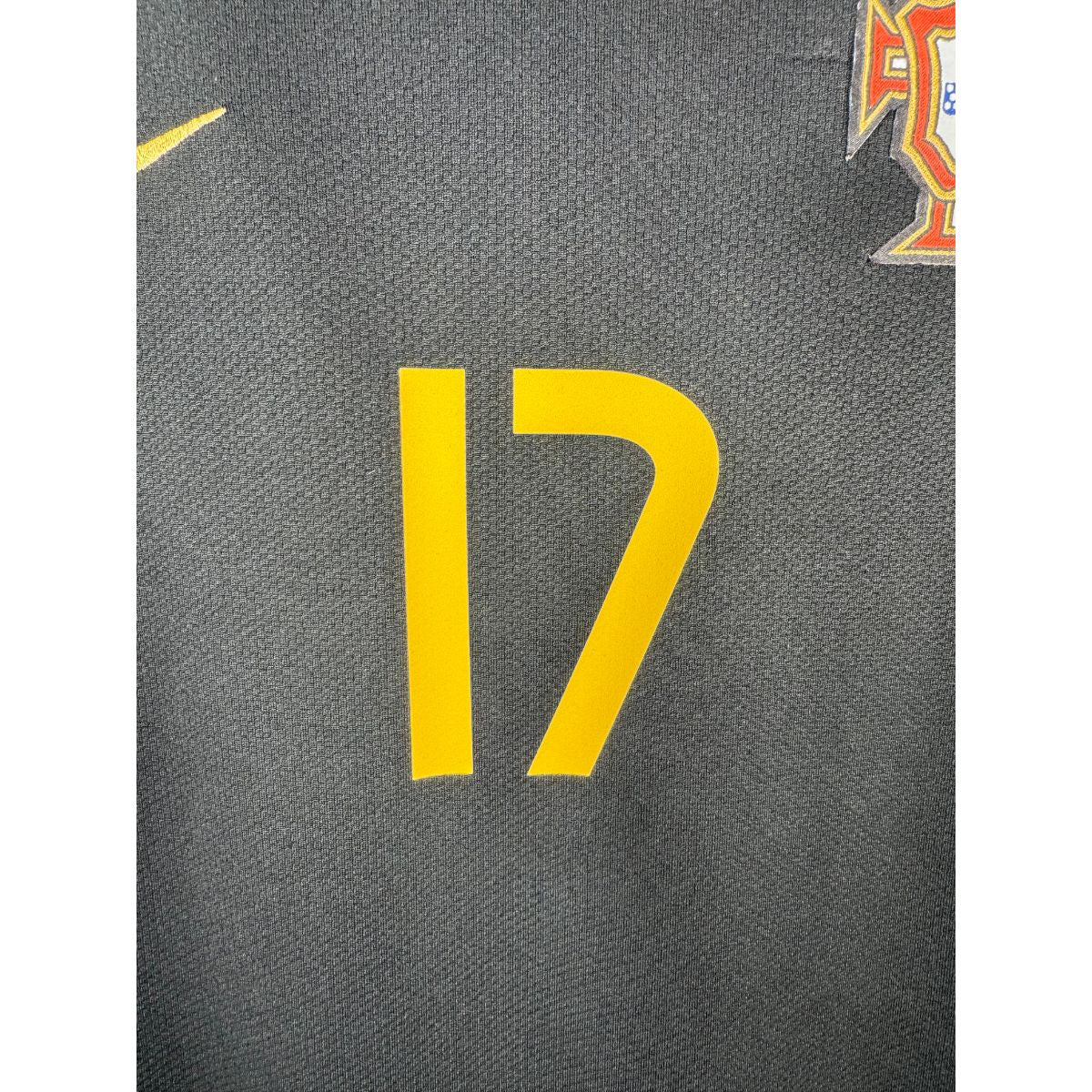 Détail de l'écusson du Portugal et du logo Nike