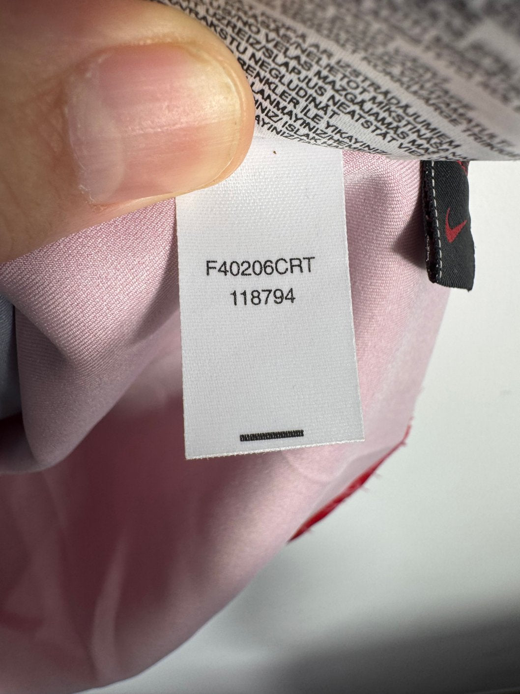 Étiquette d'authenticité avec code Nike 118794 prouvant l'originalité du maillot