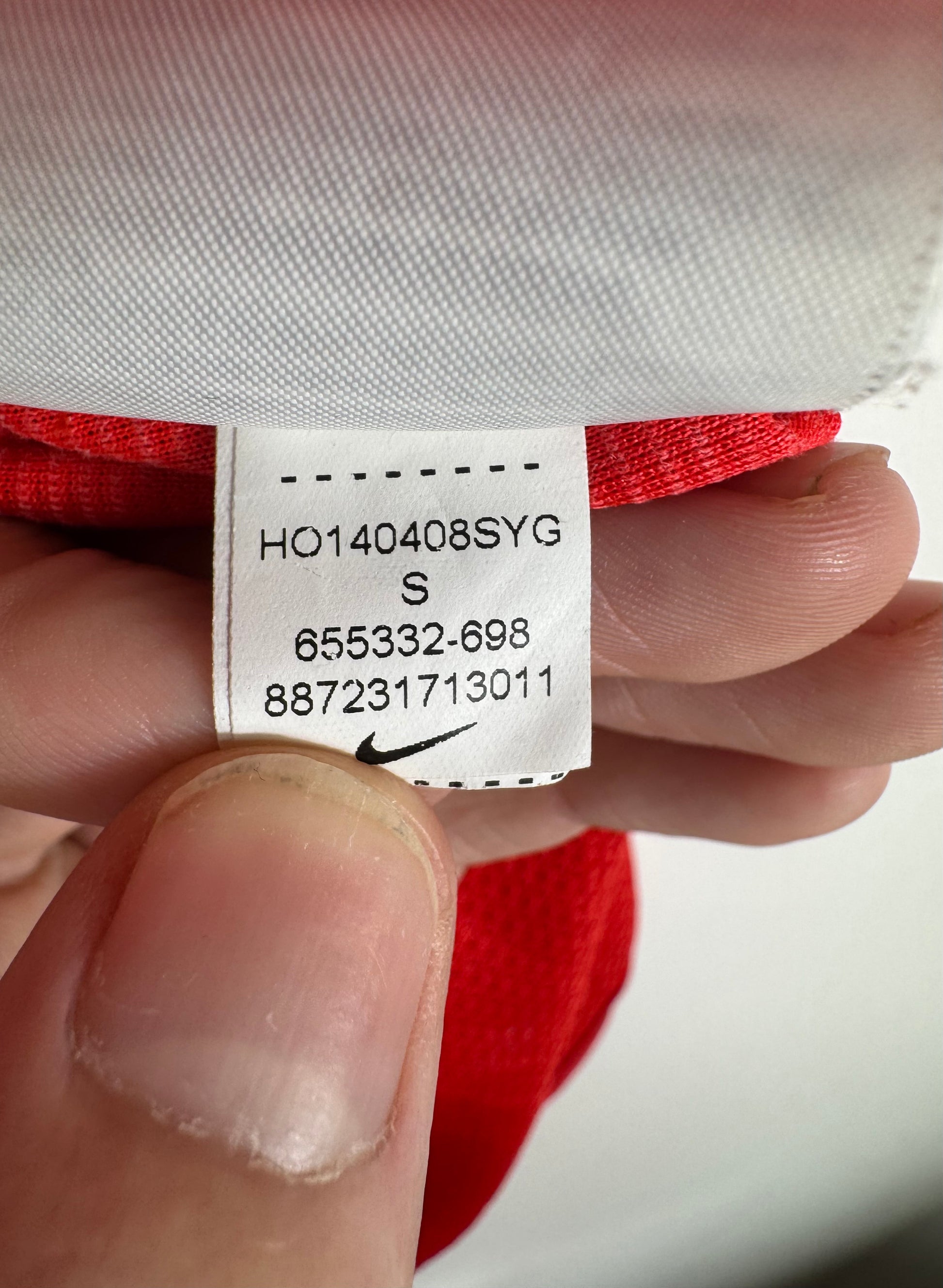 Étiquette d'authenticité avec code Nike 655332-698 prouvant l'originalité du maillot