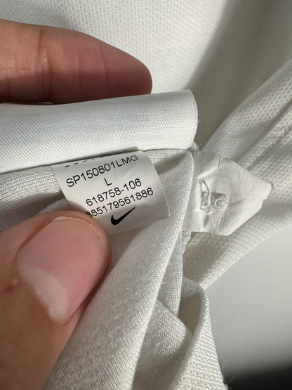 Étiquette Nike du maillot PSG 2014-2015 extérieur avec la référence 618758-106 taille L
