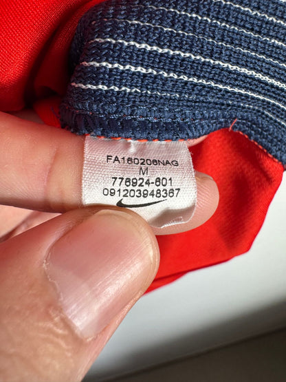 Étiquette d'authenticité avec code Nike 776924-601 prouvant l'originalité du maillot
