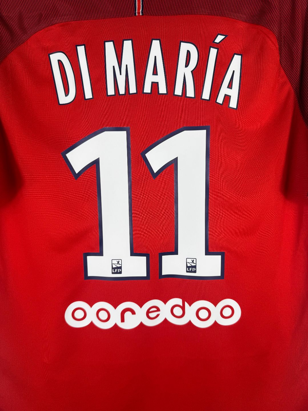 Détail de la typographie du flocage sur le numéro 11 d'Ángel Di María