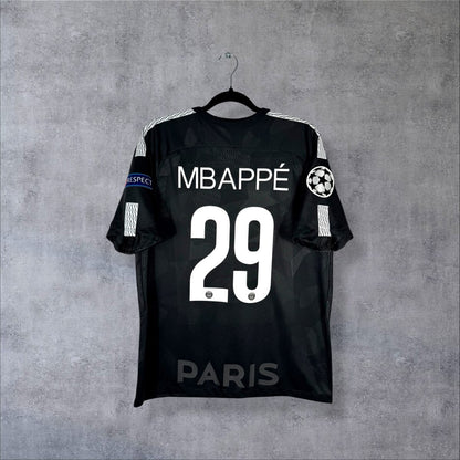 Dos du maillot PSG 2017-2018 third noir avec flocage MBAPPÉ N°29 et patch Champions League