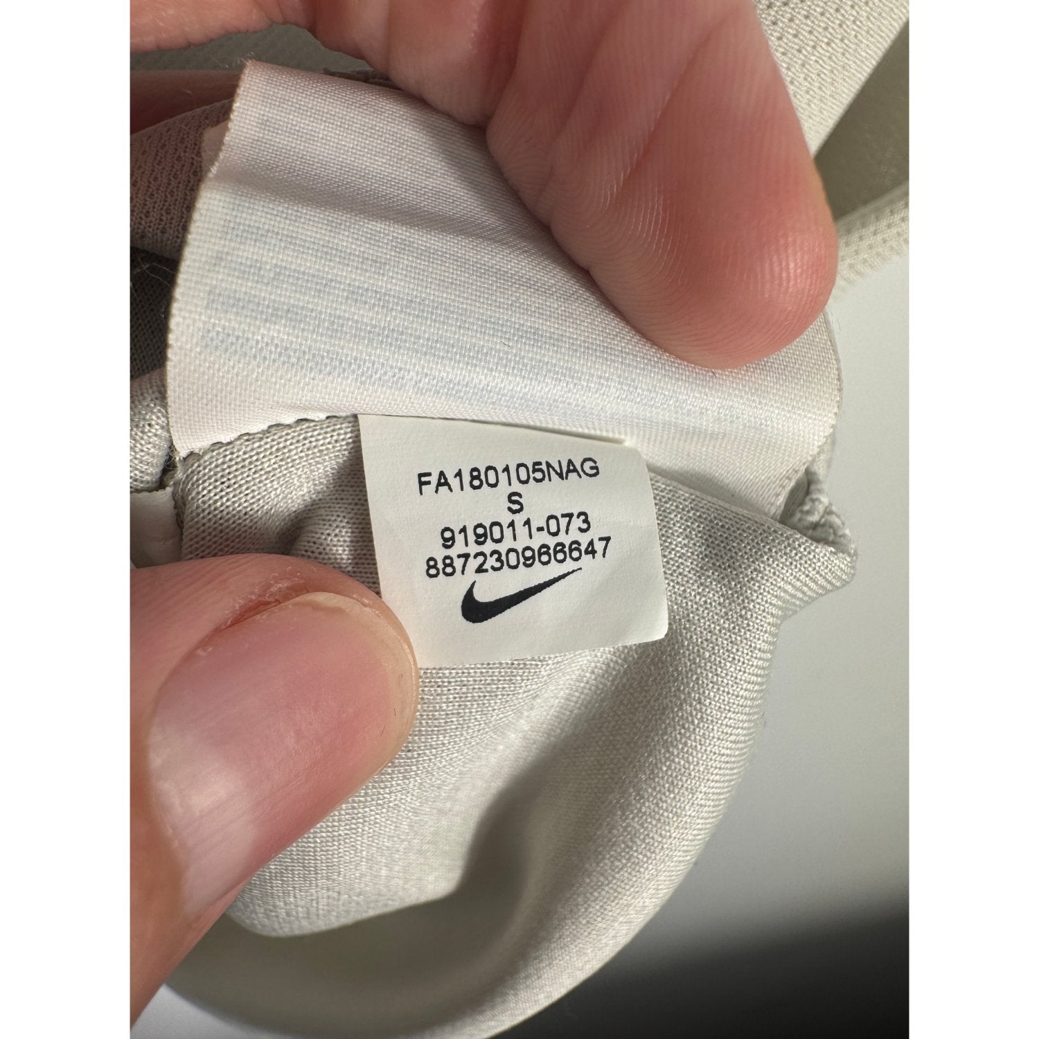 Étiquette d'authenticité avec code Nike 919011-073 prouvant l'originalité du maillot