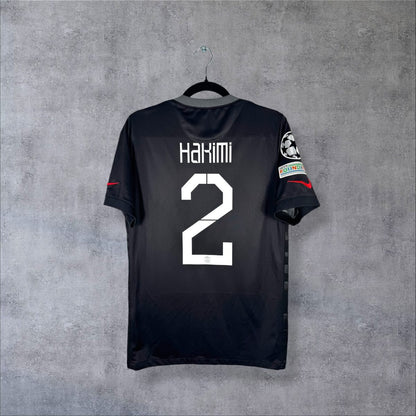 Maillot PSG 2021-2022 third noir, dos floqué Hakimi 2, patchs Ligue des Champions