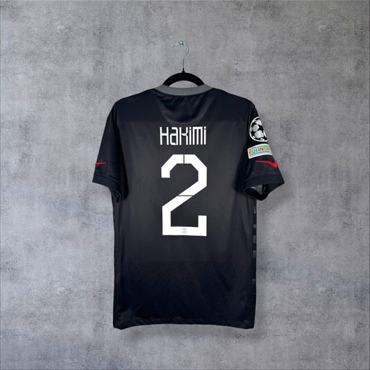 Maillot PSG 2021-2022 third noir, dos floqué Hakimi 2, patchs Ligue des Champions