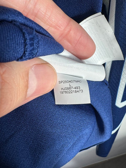 Étiquette d'authenticité avec code Jordan HJ0867-493 prouvant l'originalité du maillot