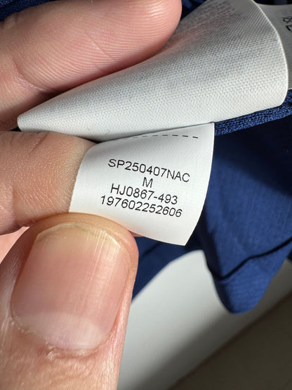 Étiquette d'authenticité avec code Jordan HJ0867-493 prouvant l'originalité du maillot