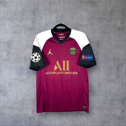 Vue de face du maillot PSG Third 2020/21 bordeaux et blanc avec logos dorés et sponsor ALL.