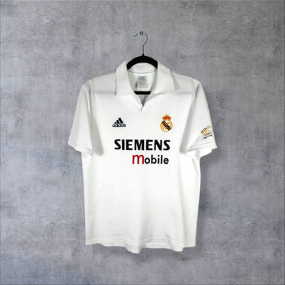 Face du maillot Real Madrid 2002-2003 domicile adidas à col polo avec sponsor Siemens mobile et logo du centenaire sur la manche